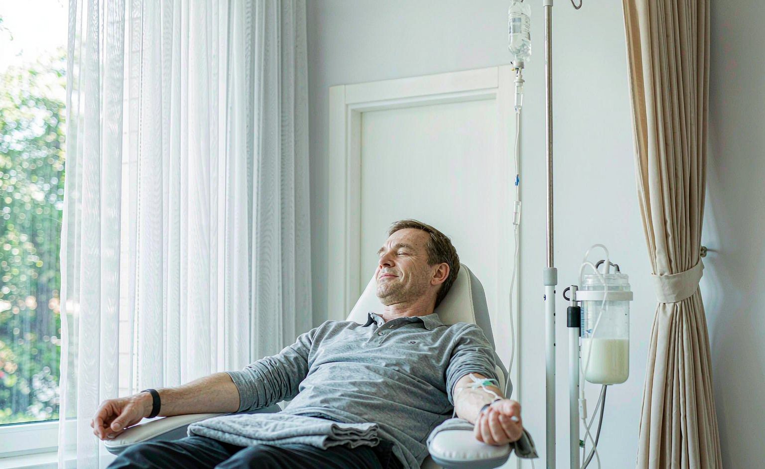 Relaxing IV vitamin drip in a bright clinic